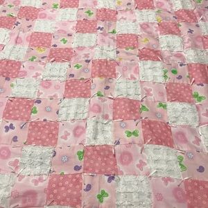 Baby Quilt in pink, purple and white.